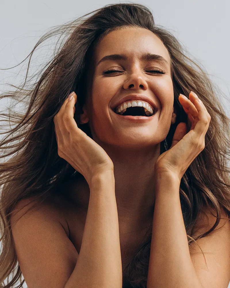 Woman With A Beautiful Glowing Smile