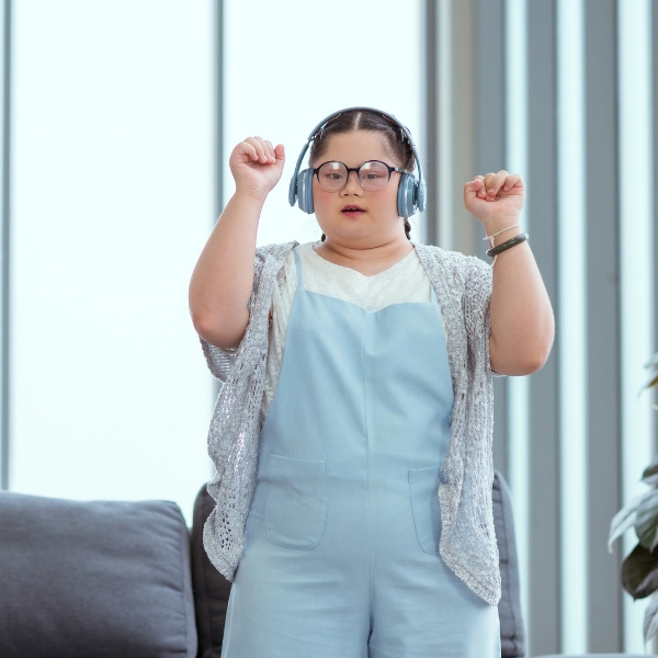 Girl With Autism Wearing Headphones