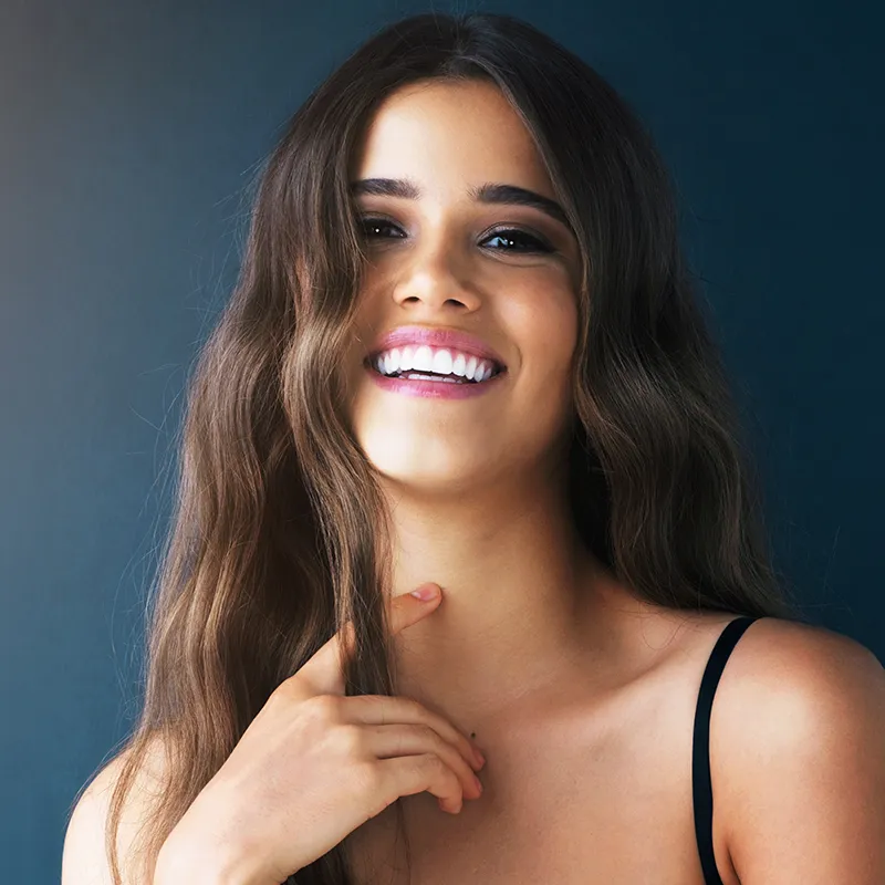 Woman Smiling With Beautiful Porcelain Veneers