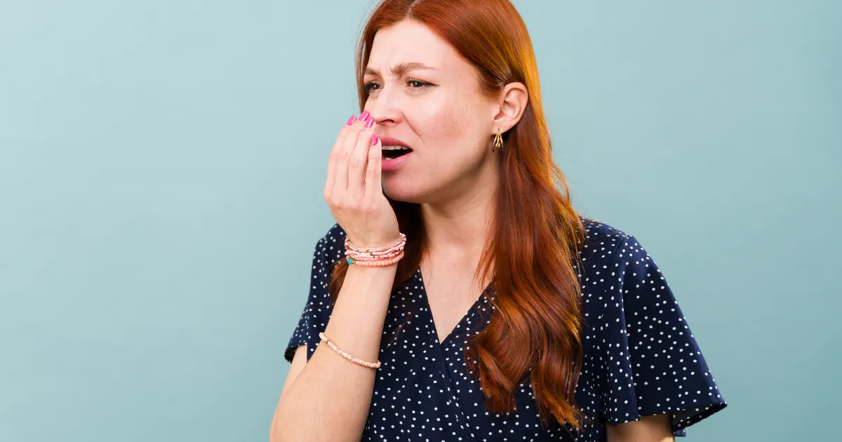 Woman Checking Bad Breath